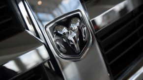 The Dodge logo on the grille of a truck