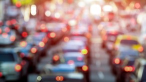 Traffic jam gridlock with cars stopped on a highway