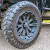 Closeup of custom wheels and tires on a built Jeep Wrangler