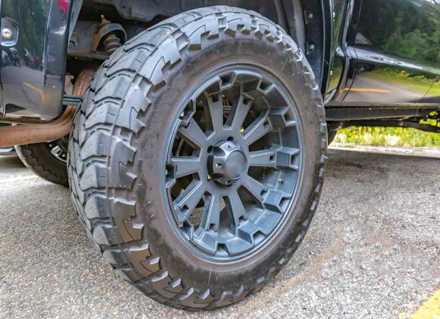 Closeup of custom wheels and tires on a built Jeep Wrangler