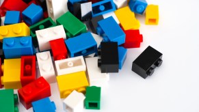 Colorful lego bricks on a white background.