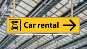 Airport sign showing where to go for rental cars