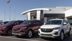 Buick GMC dealership exterior with SUVs parked out front