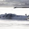 The crashed Delta flight out of Minneapolis that flipped onto its roof in Toronto after losing its right wing on 2/17/2025