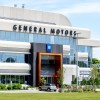 A General Motors building on a sunny day