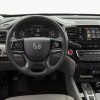 The interior view of a 2021 Honda Pilot with a Honda 3.5L V6 engine from the driver's perspective