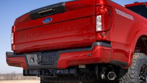 The tailgate of a Ford Super Duty truck with a "Super Duty" stamp.