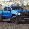 The 2025 Chevy Silverado off-roading in gravel