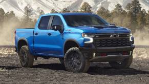 The 2025 Chevy Silverado off-roading in gravel