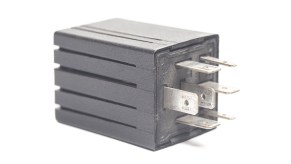 Gray relay for a car's ignition or fuel pump.