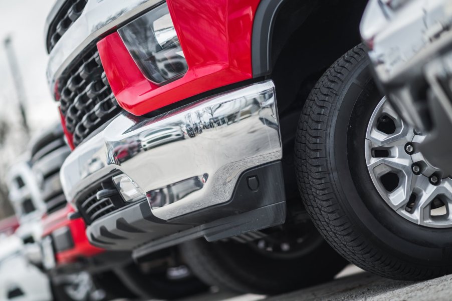 Row of full-size Detroit pickup trucks and SUVs which failed to earn the IIHS safety pick in 2025.