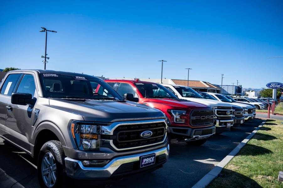 These new Ford F-150 trucks parked in a dealership lot command record high payments.