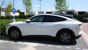 White Ford Mustang EV crossover.