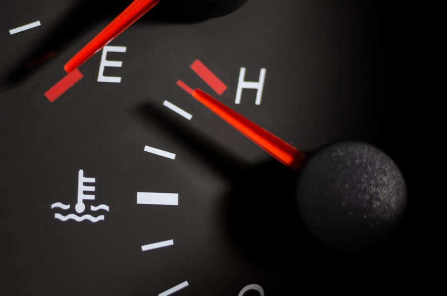 Instrumentation at a mechanics shop shows a vehicle overheating.