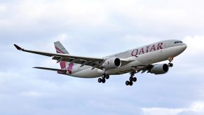 A couple sat next to a dead person on a long-haul Qatar Airways flight.