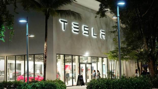 A Tesla storefront vacated ahead of protests and tariffs squeezing the business.