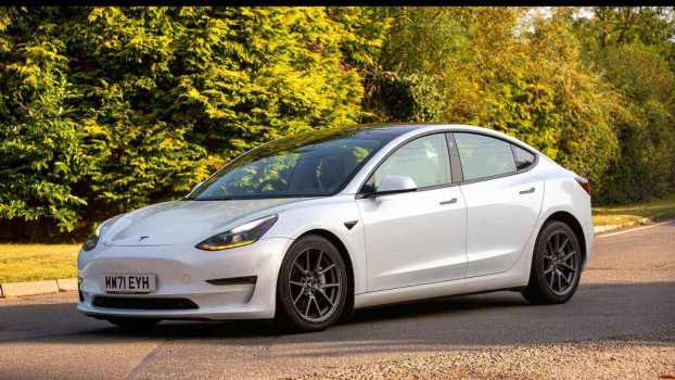 A Tesla Model 3 in the UK after charging its battery.