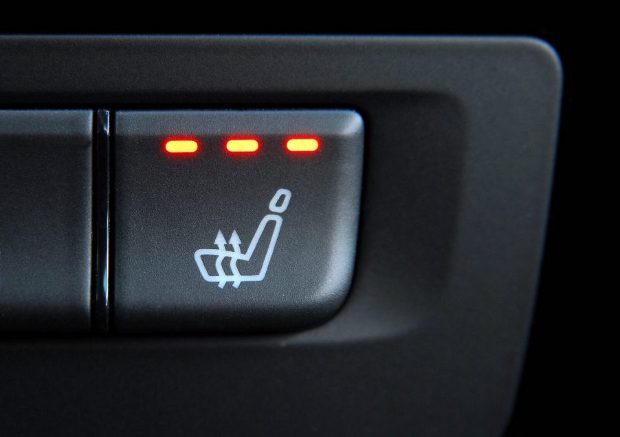 Heated seat button settings in a car in very close view