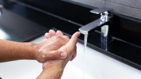 Man washing his hands in close view