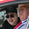 Tesla CEO Elon Musk and President Donald Trump sitting in a Tesla Model S together outside the White House