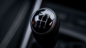 A manual transmission's gear selector, photographed from the top down